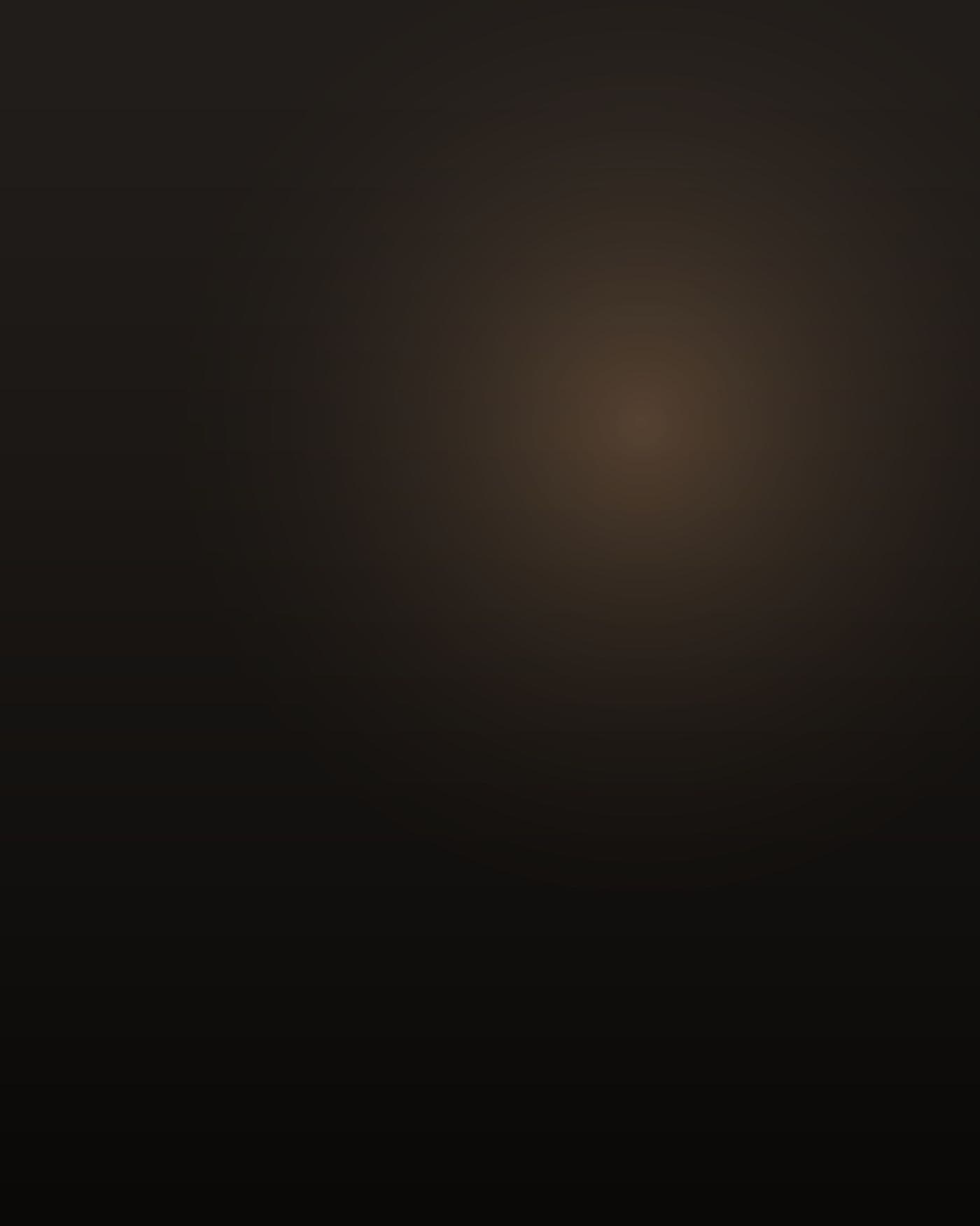 A short, stocky Latino man in his late thirties, thick through the chest and shoulders, dark hair cut close, heavy black mustache, drywall dust on his forearms and the knees of his jeans, standing turned away in the doorway of a dim kitchen at night, lit warm by one bulb over the stove with blue television light spilling in from a room behind him, deep shadow, his face not visible.